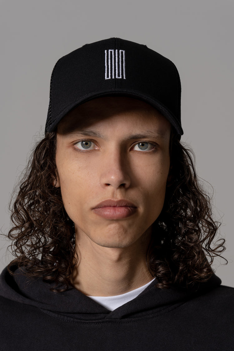 surf article 7 logo trucker hat