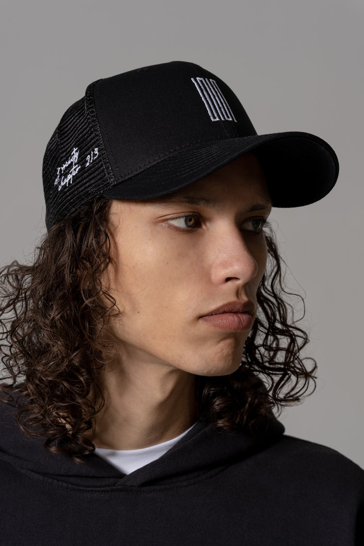 surf article 7 logo trucker hat