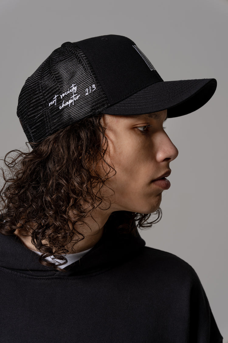 surf article 7 logo trucker hat