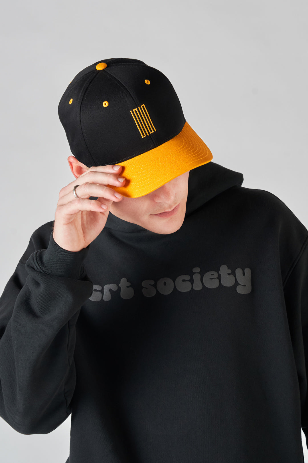 ramona article 7 logo hat black gold